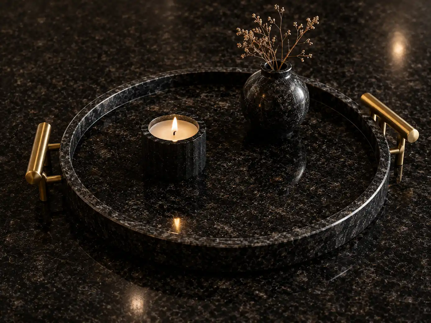 Dark granite surface with granular mineral character